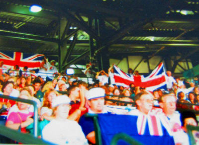 Spectators flying country flags at the 1996 Atlanta Paralympics
