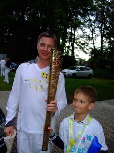 Daniel and his dad, Andy, at evening celebrations of the Torch Relay held in Oxford